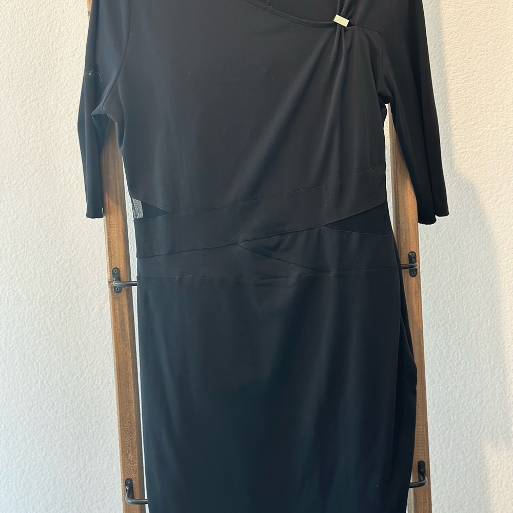 Obsessed with this stunning XL black dress from Kim Kardashian's collection!